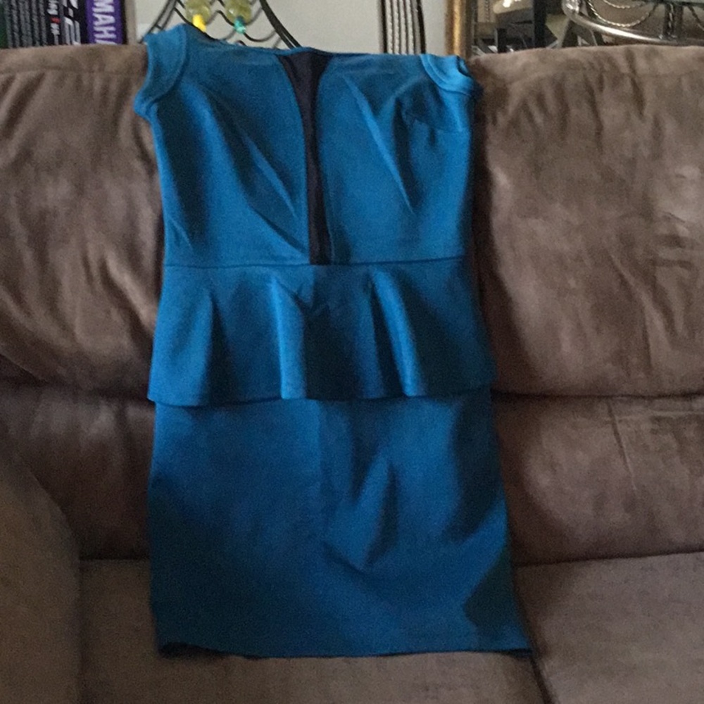 Brand New! Blue pallium short sleeve dress.